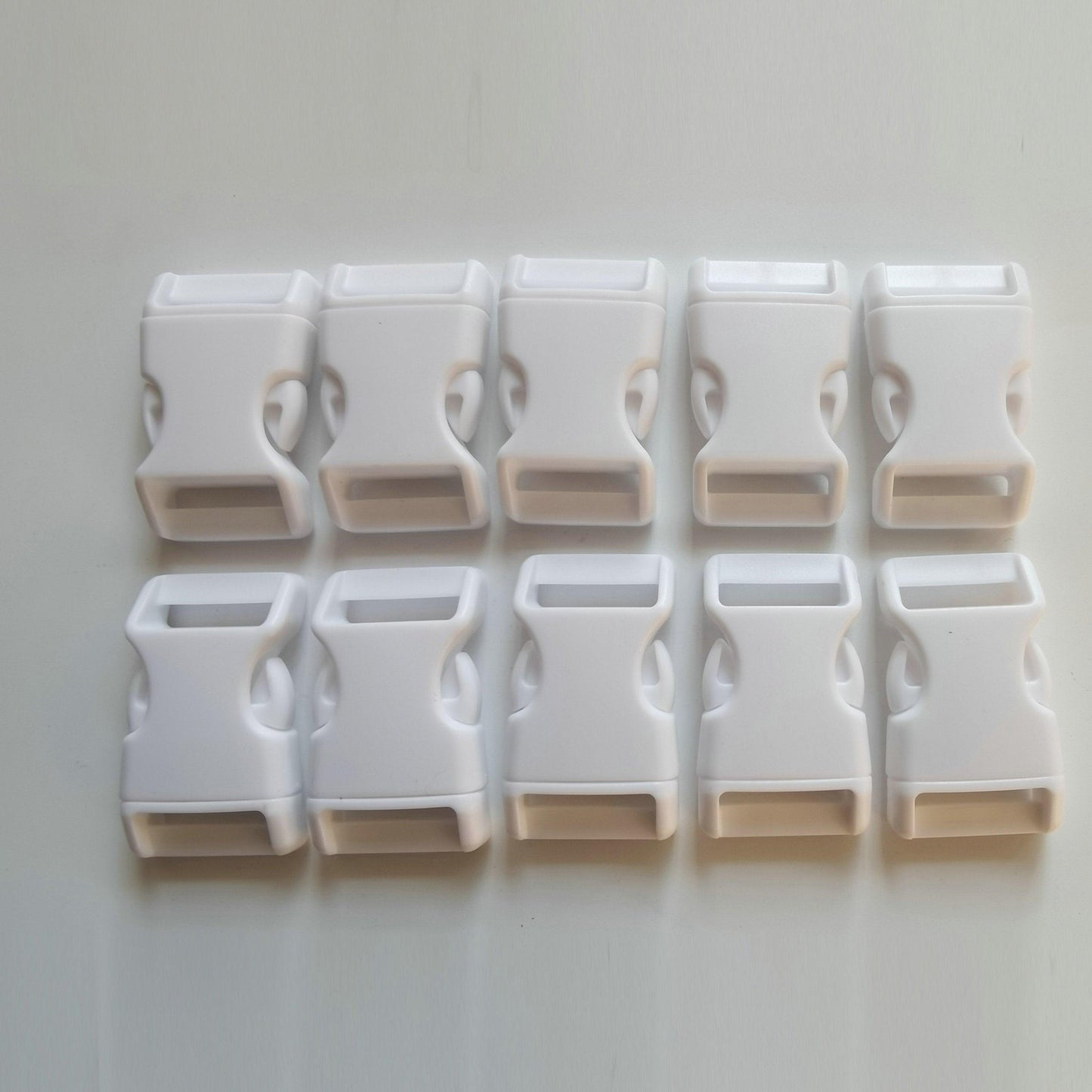 White - 25mm Curved side release buckle - Cams Cords